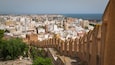 Alcazaba showing heritage elements, a coastal town and landscape views