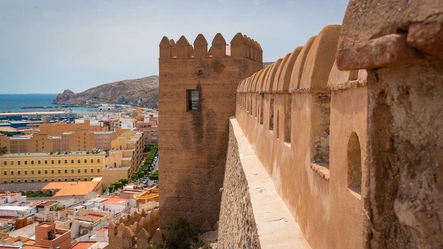 Alcazaba which includes heritage elements and a coastal town