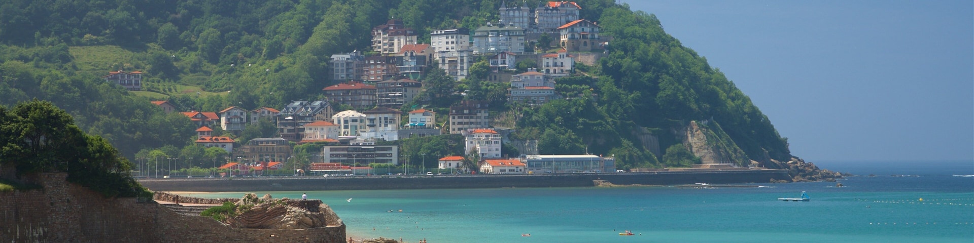 Strand von Concha welches beinhaltet Sandstrand, allgemeine KĂŒstenansicht und KĂŒstenort
