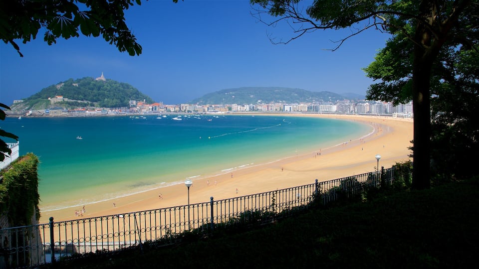 Miramar Palace showing a beach, a coastal town and general coastal views