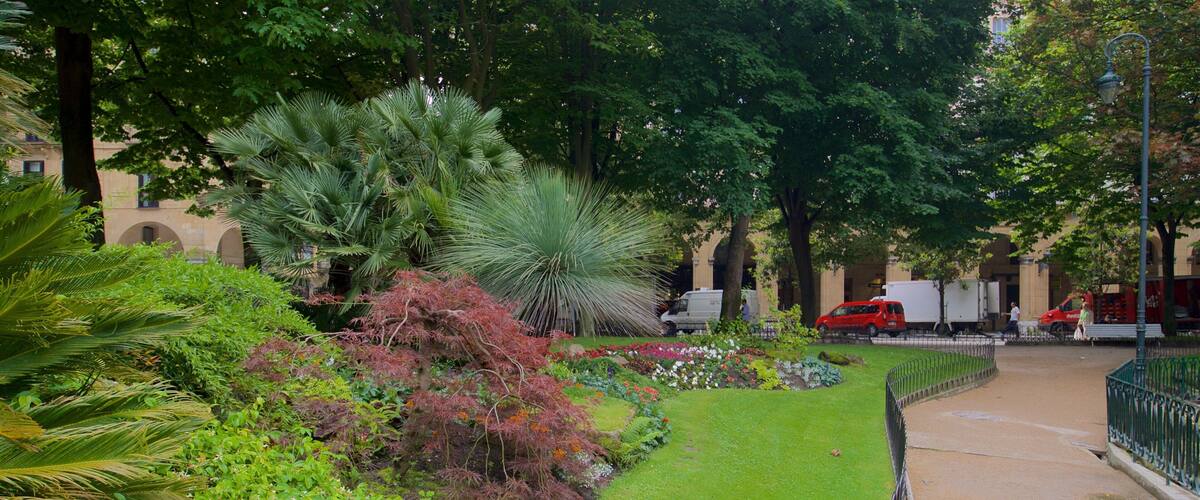 Plaza Gipuzkoa which includes a park and flowers