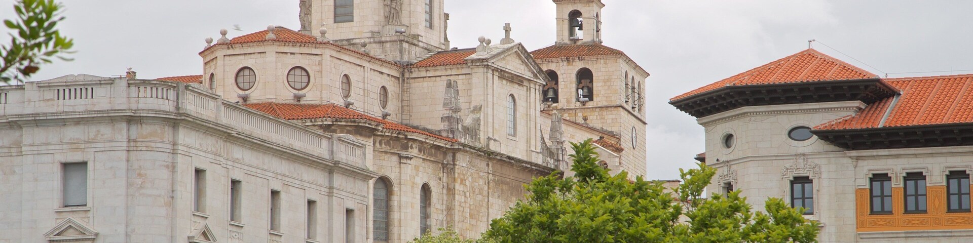 A historic church with a bell tower and a clock.