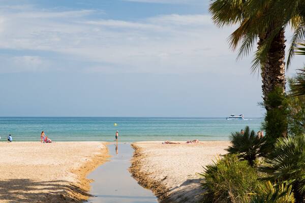 Cambrils Beach which includes general coastal views and a sandy beach