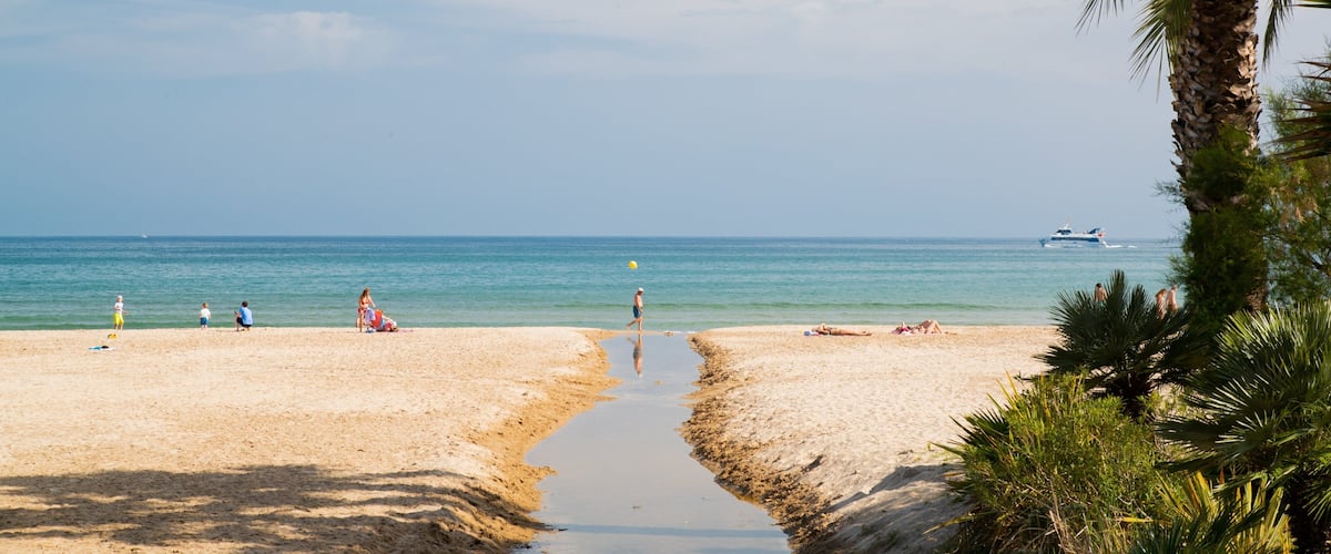 Cambrils Beach which includes general coastal views and a sandy beach