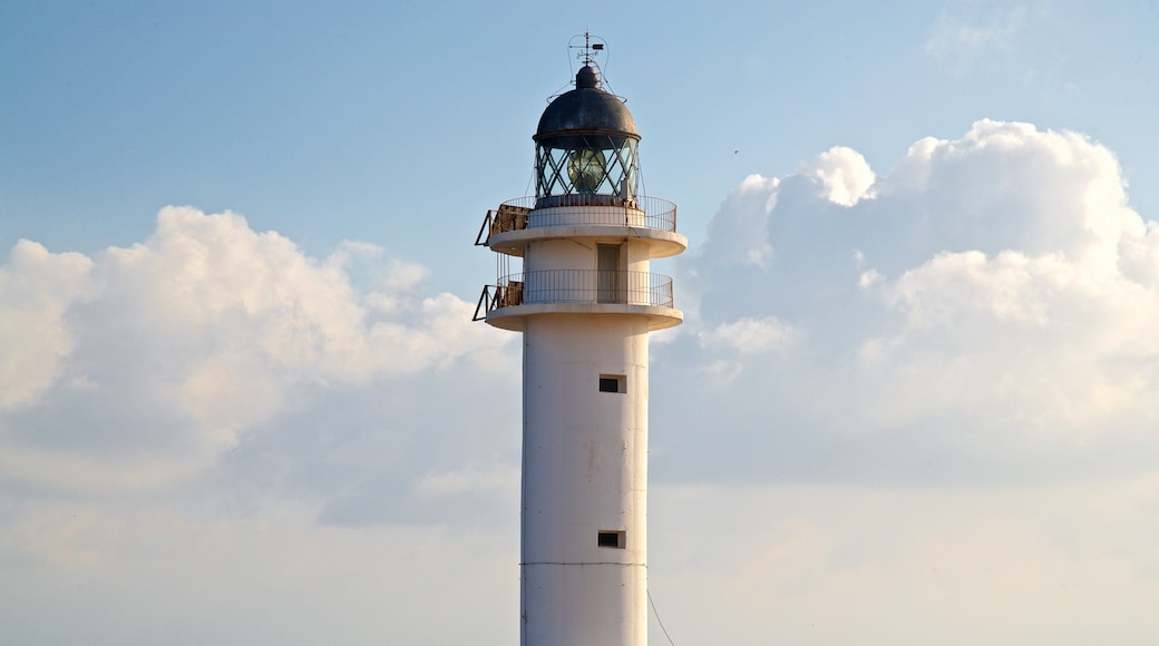 Cap de Barbaria Lighthouse featuring a lighthouse and a sunset