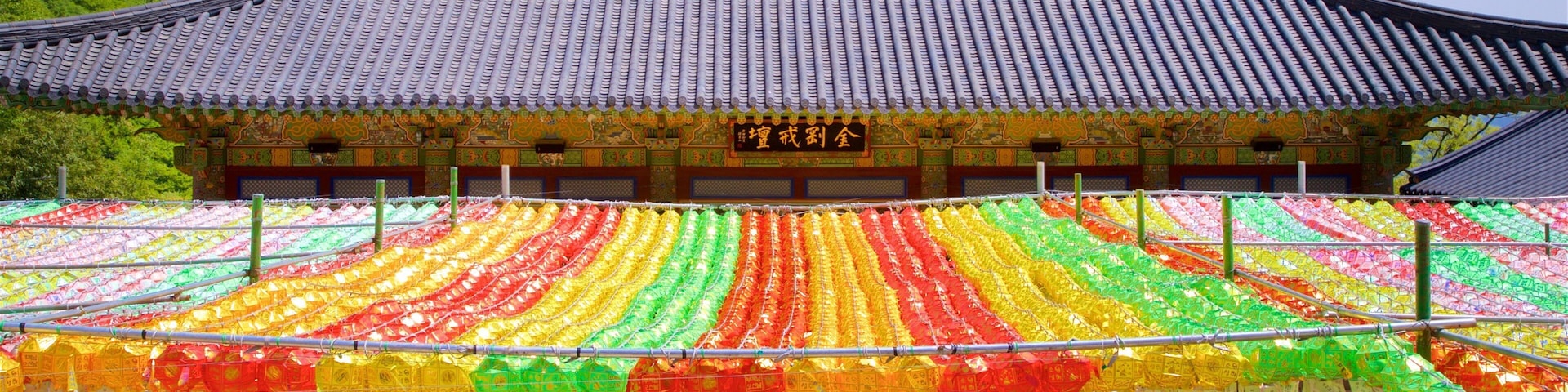 Beomeo-sa Temple showing heritage elements as well as a small group of people