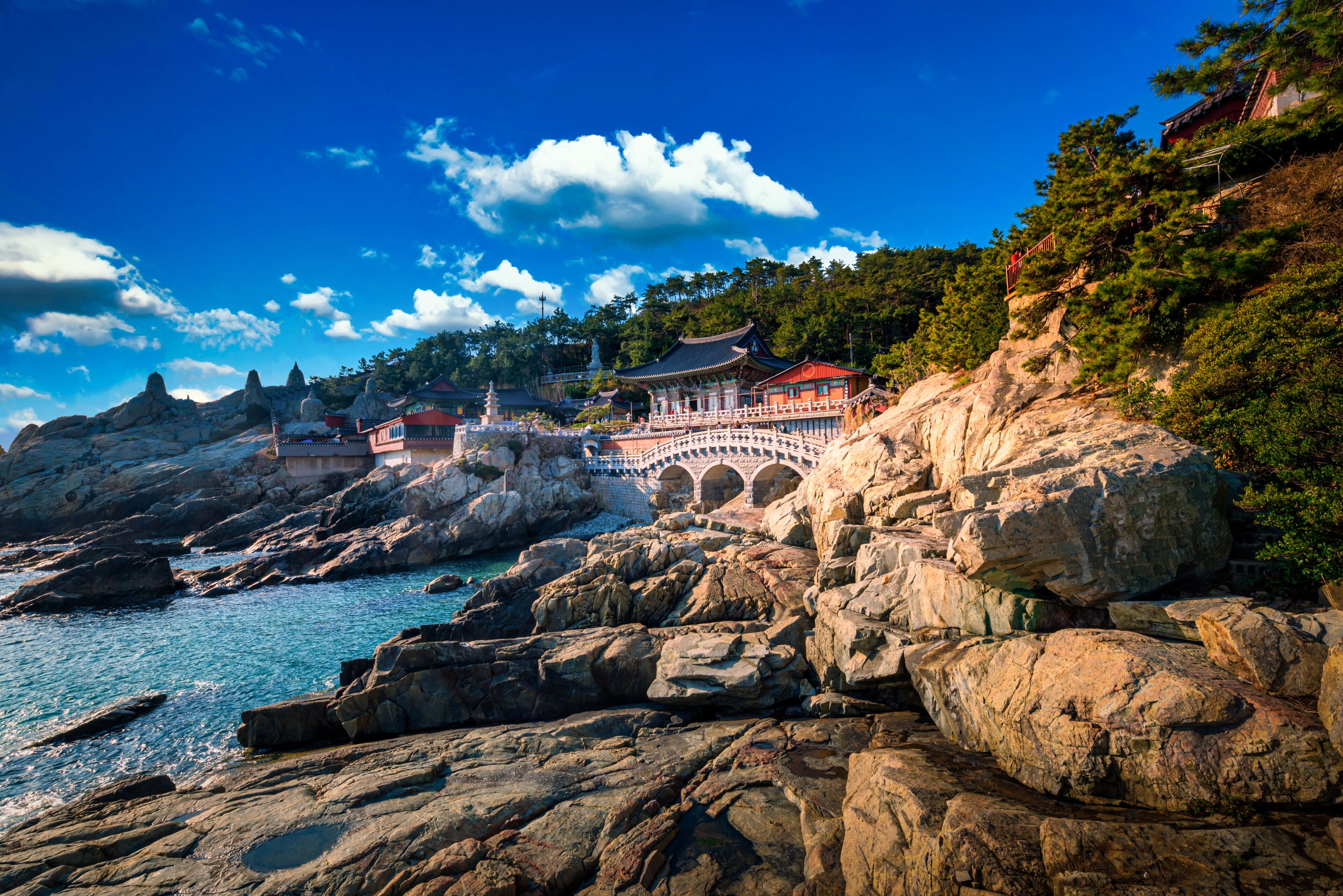 Haedong Yonggungsa Temple on blue sky at daytime in Busan, South Korea.