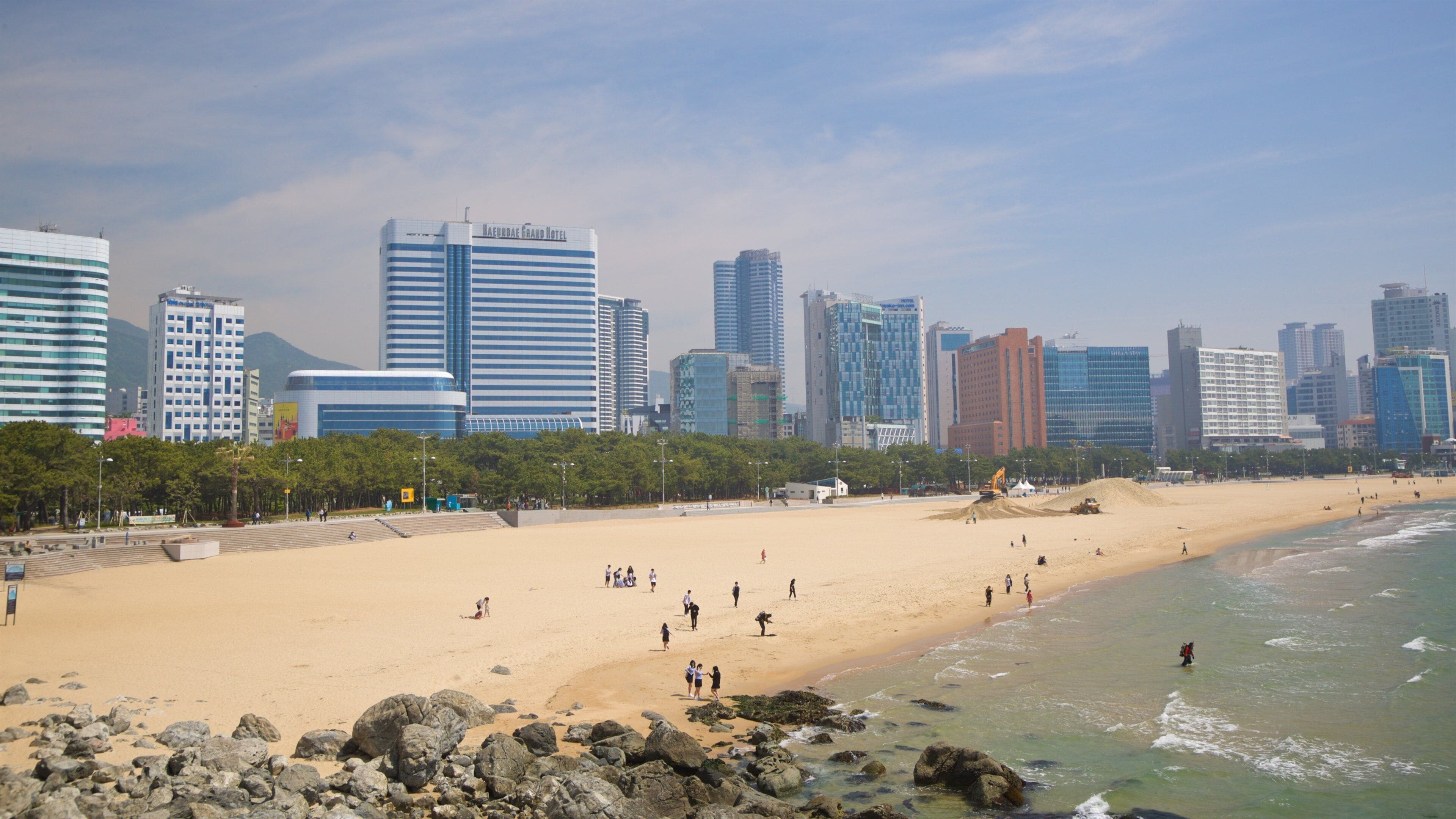 Haeundae Beach which includes general coastal views, a city and a coastal town