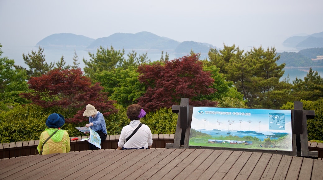 Hallyeo-haesang National Park which includes views and signage as well as a small group of people