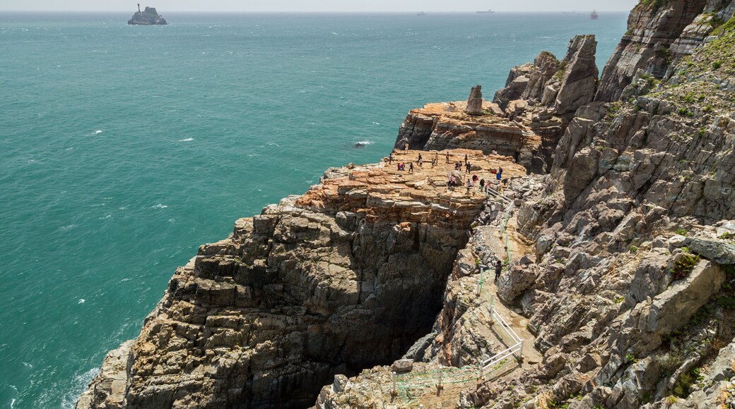 View of Sinseon Rock, rocky and steep cliff and ocean at the Taejongdae Resort Park in Busan, South Korea.