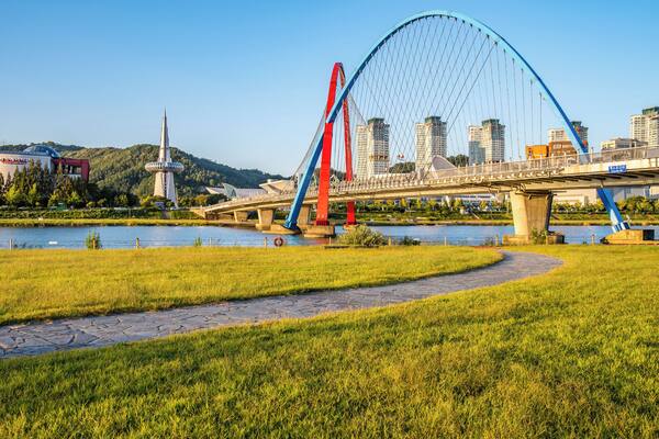 View of lawn and bridges in Expo Park at Gapcheon