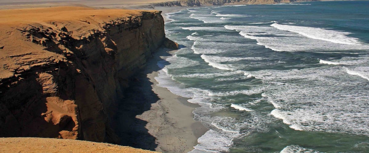 The coastline at the Paracas National Reserve in Peru. This reserve is a great place to see flamingos, sea lions and whales. We also observed several porpoises from the shoreline. There were several places along the shoreline that allow access to the beaches below.