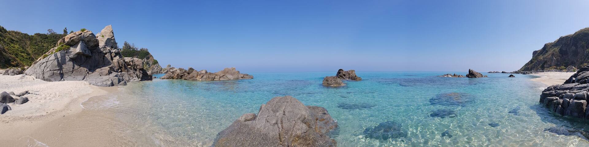 panorama of a wild beach with blue water city Zambrone, Calabria, Italia; Shutterstock ID 1451560595; Purchase Order: -
