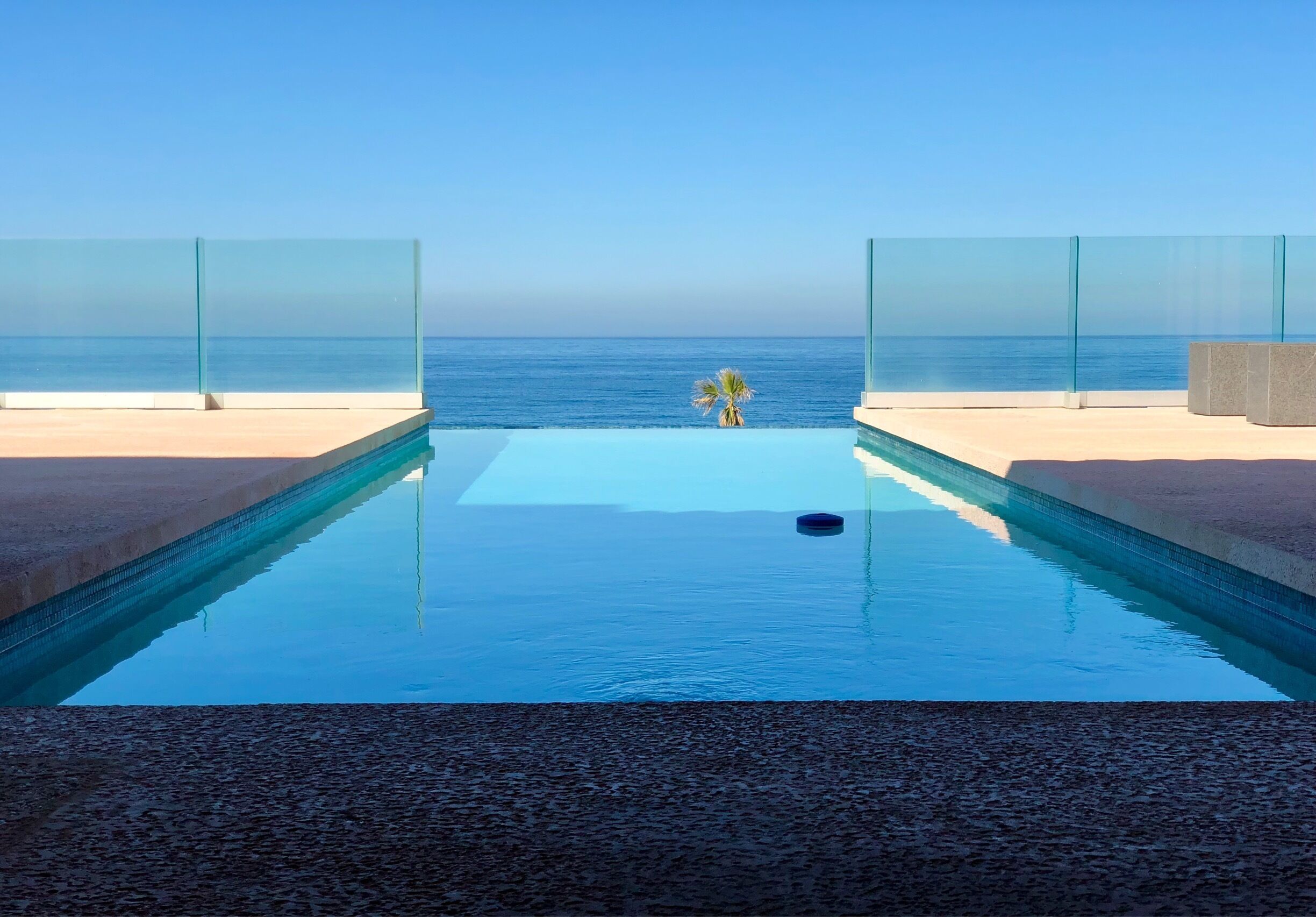 A infinity pool with a view of the ocean.