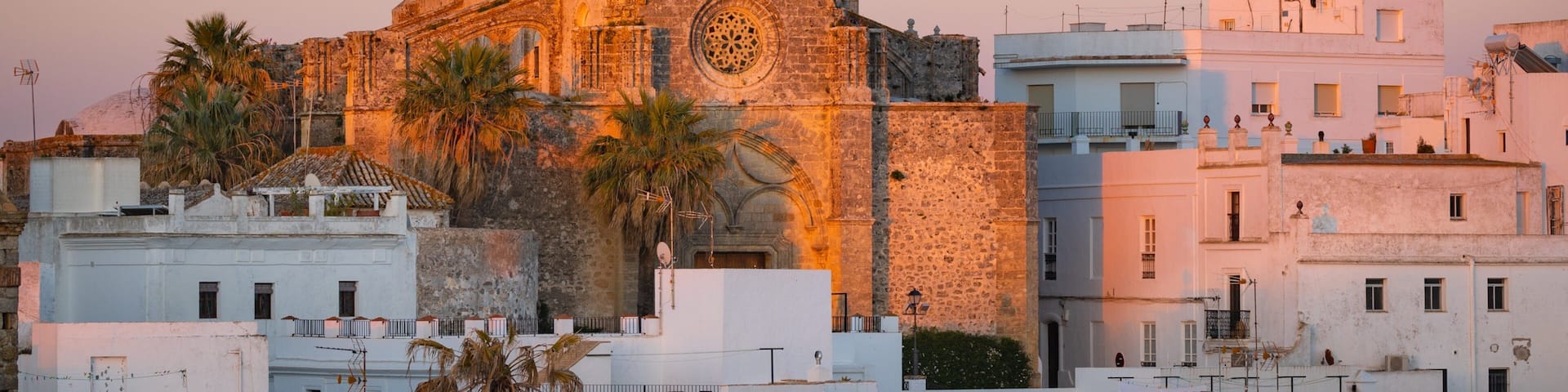 Vejer de la Frontera showing heritage architecture, landscape views and a sunset