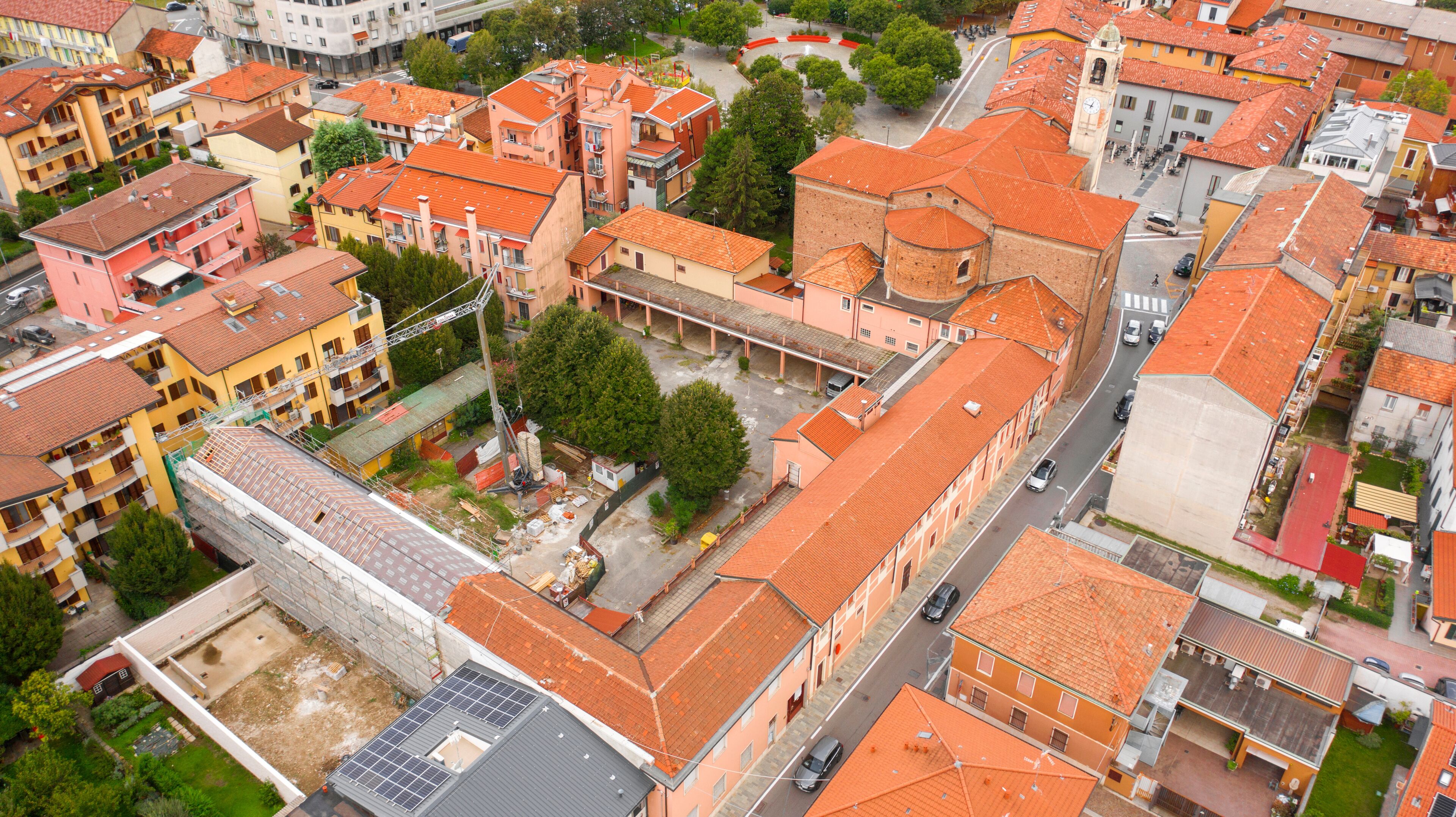 Aerial view of the parish church of San Remigio in Vimodrone, in the metropolitan city and archdiocese of Milan, Italy. This Catholic place of worship is part of the deanery of Cologno Monzese.