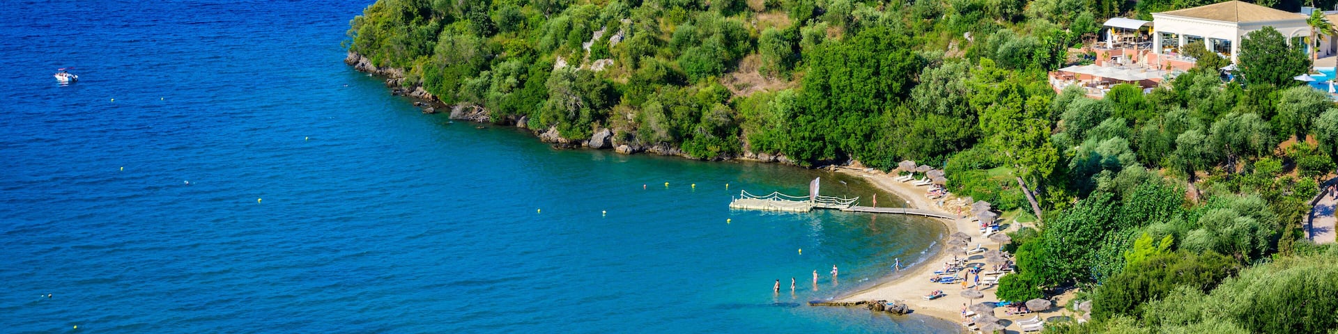 Spilios beach at Kommeno is close to Kerkyra is a paradise beach with crystal clear azure water in Corfu, Ionian island, Greece, Europe