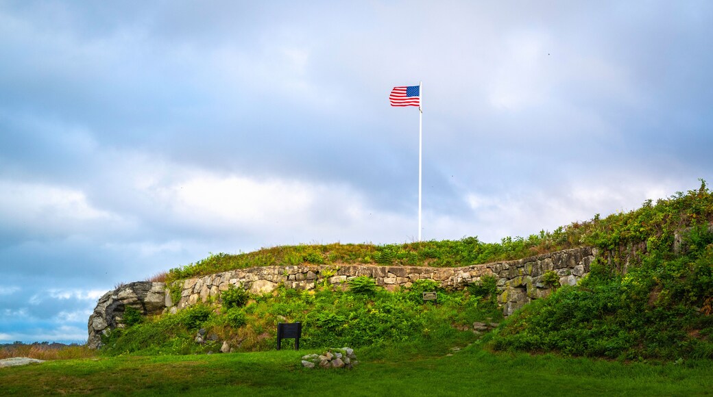 American flag waving against cloudy sky at Fort Griswold Battlefield State Park