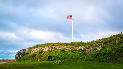 American flag waving against cloudy sky at Fort Griswold Battlefield State Park