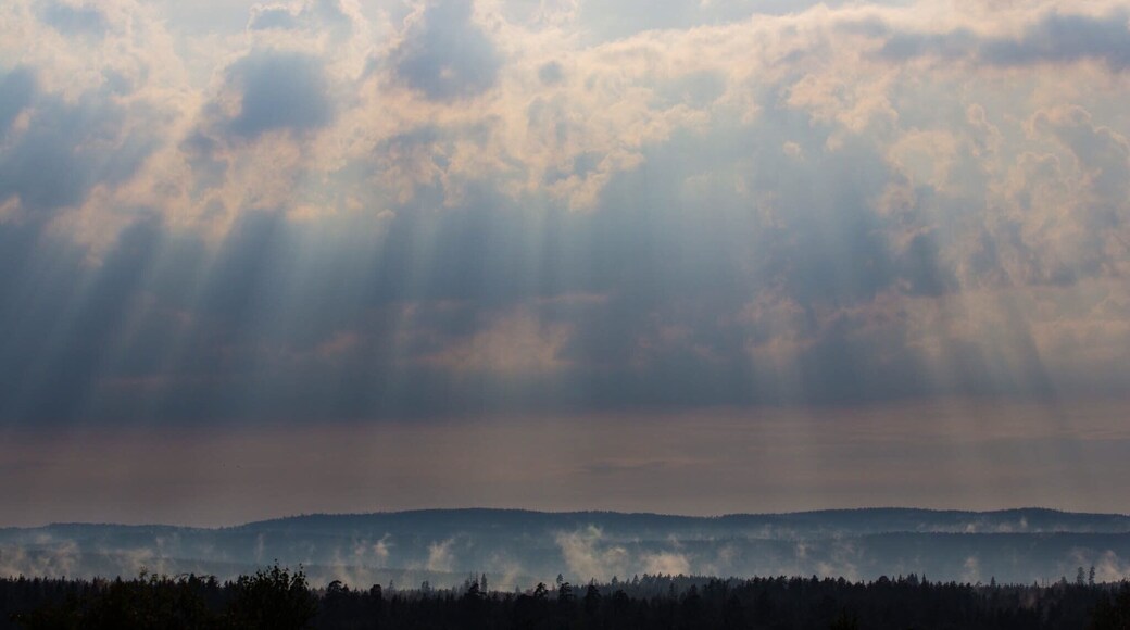 Sun breaking through the clouds after a thunder storm.