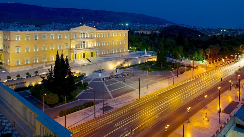 Syntagma Square showing a city, a square or plaza and night scenes
