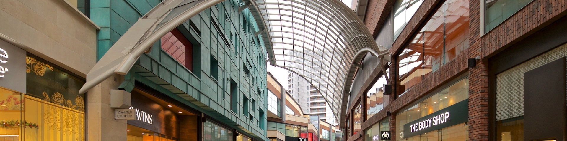Cabot Circus Shopping Centre showing street scenes and shopping as well as a small group of people