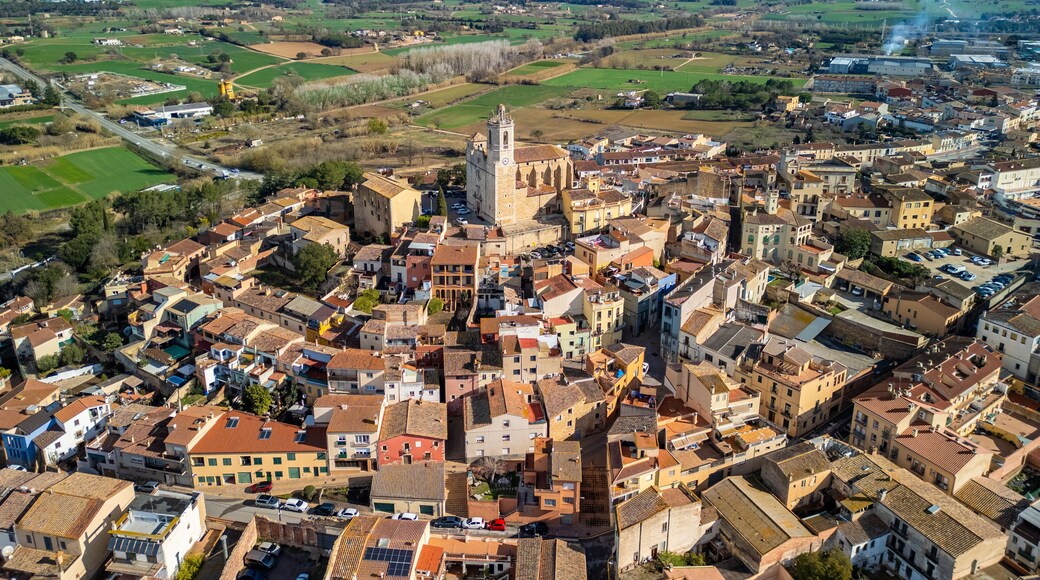 Take a virtual tour above Llagostera and witness the timeless charm of Spain's medieval villages along the picturesque Costa Brava.