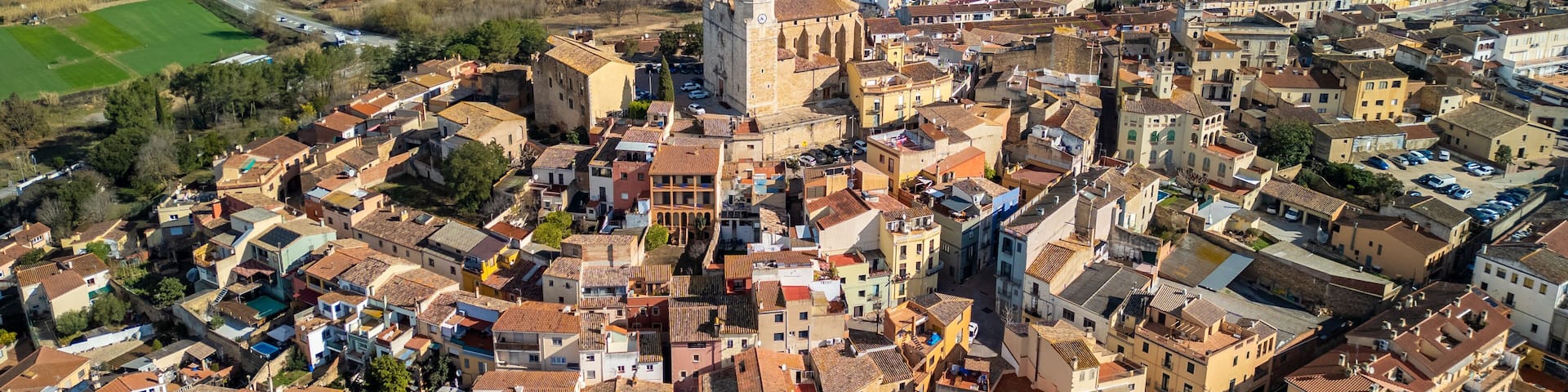 Take a virtual tour above Llagostera and witness the timeless charm of Spain's medieval villages along the picturesque Costa Brava.