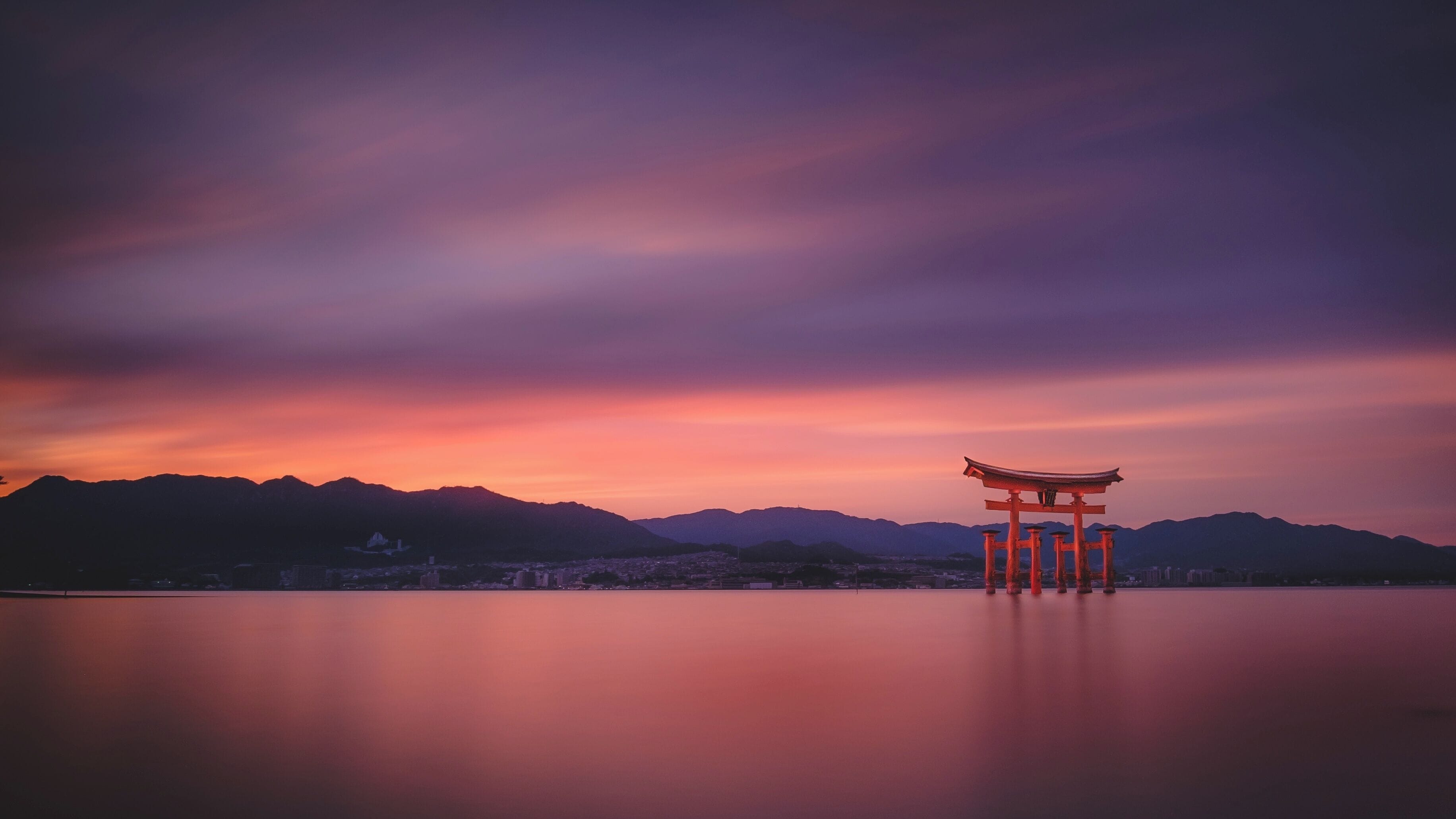 A photograph of the famous Tori gate in the water on Miyajima Island.
Very easy access to the beach - just watch out for the deer. While I was taking this picture a deer was going through my camera bag and heading off down the beach with one of my filter holders. A fantastic island for photographers and tourists in general and well worth an overnight visit if you're going to Hiroshima, as it's only an hour away, and free to get to if you're on a JR rail pass.