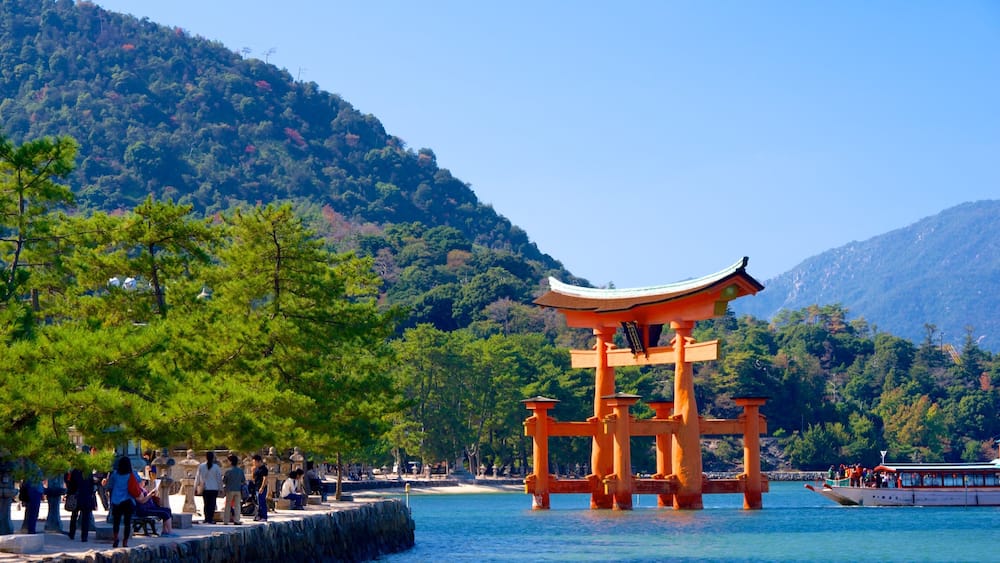 Itsukushima Shrine featuring mountains and heritage elements
