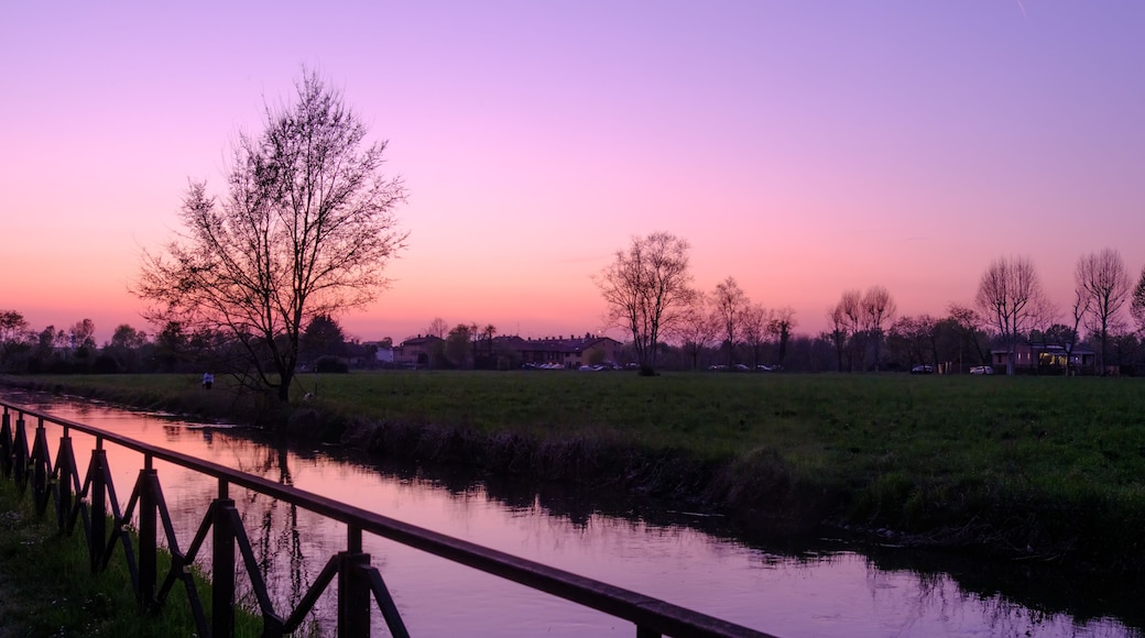Country landscape along the Canal of Martesana, Milan, Italy, at sunset