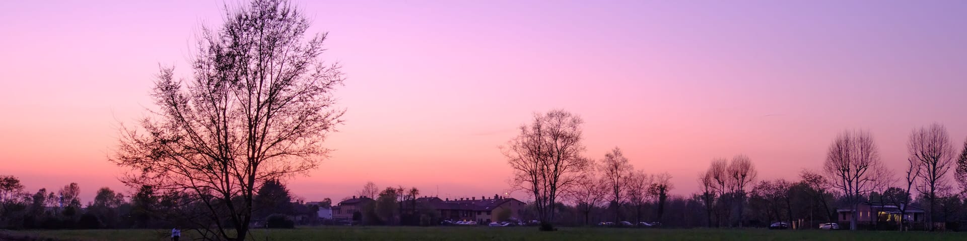 Country landscape along the Canal of Martesana, Milan, Italy, at sunset