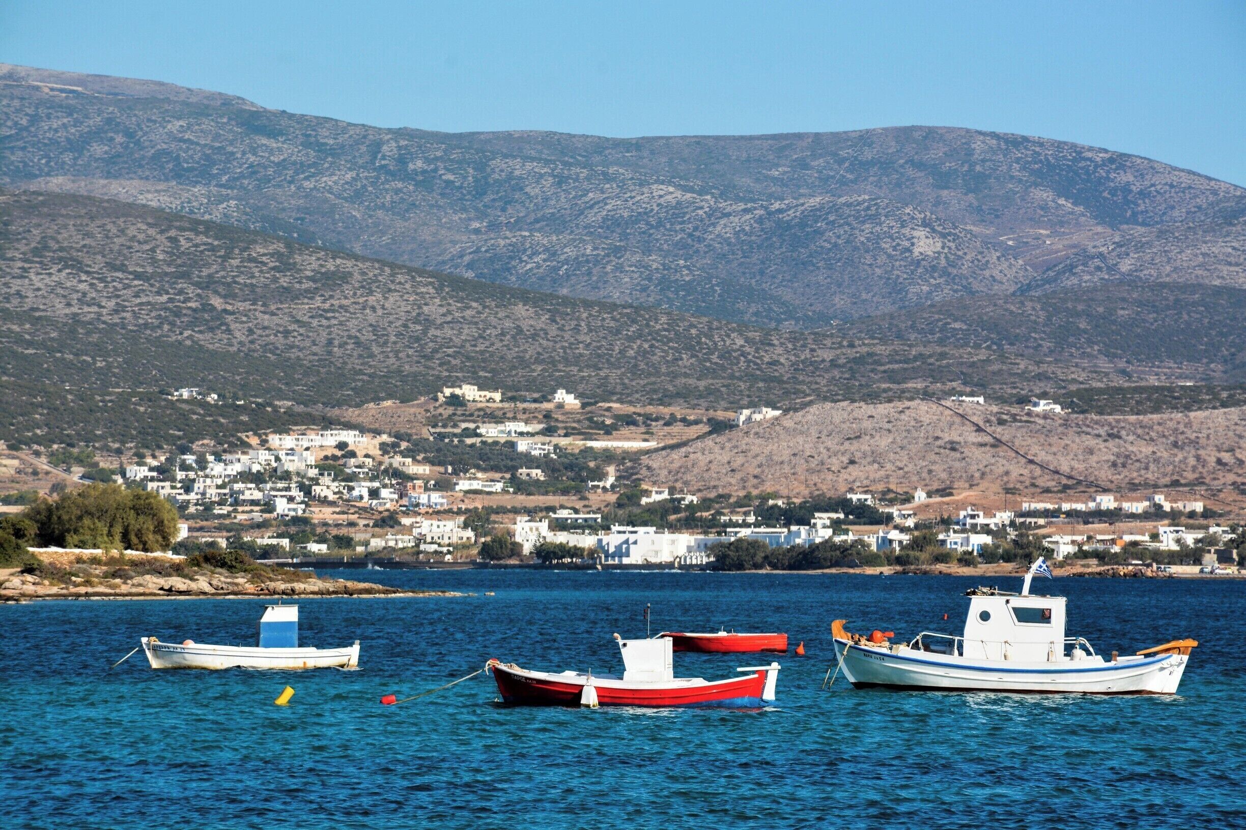 The harbor of Antiparos, a small island off of Paros, in the Cyclades group in the Greek Aegean. Paros is relatively quiet, compared to nearby Mykonos, and Antiparos is even quieter, especially after the end of the main tourist season. I had a beach there practically to myself.