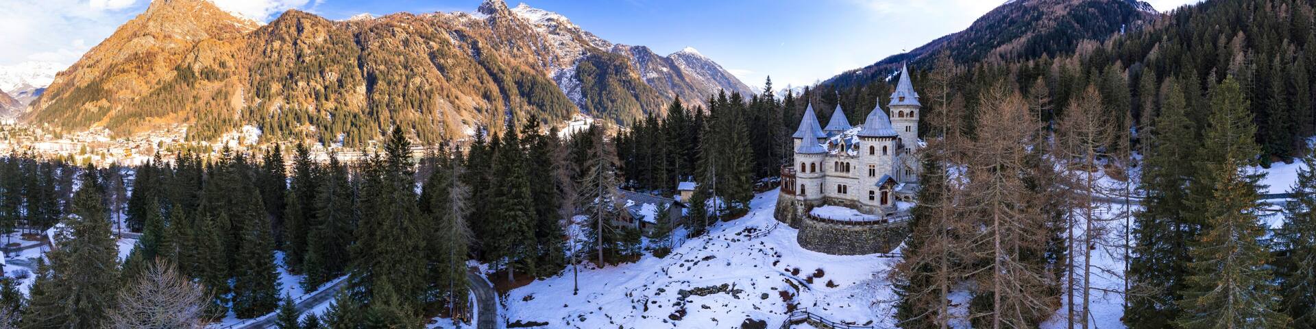 amazing fairytale medieval castle Savoia in Valle d'Aosta north of Italy. aerial drone view panorama