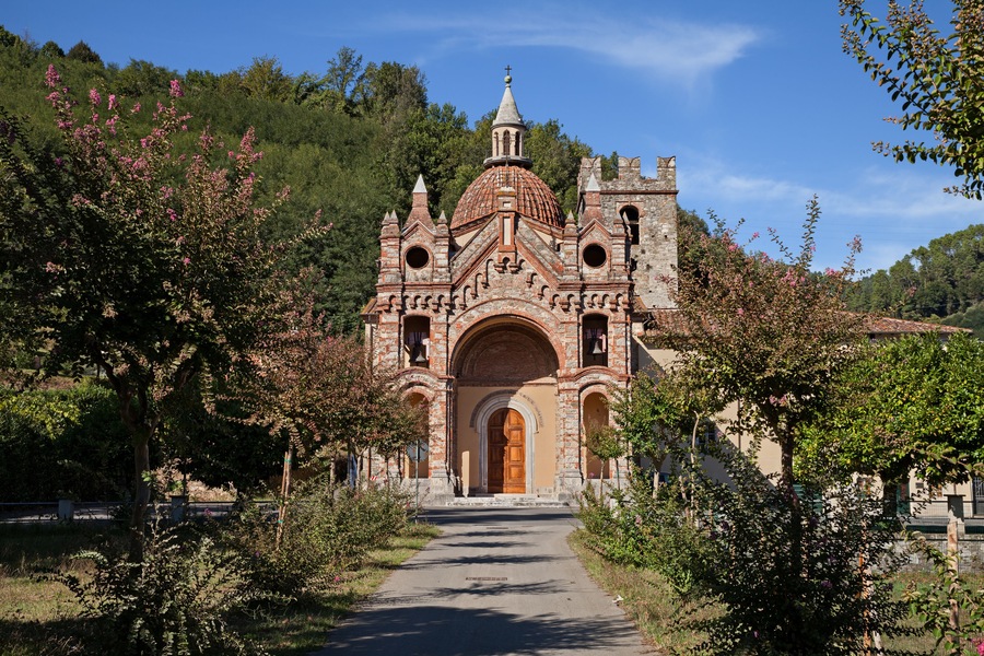 Pescaglia, Lucca, Tuscany, Italy: the catholic church of San Martino In Freddana in eclectic style with the ancient bell tower of romanesque architecture