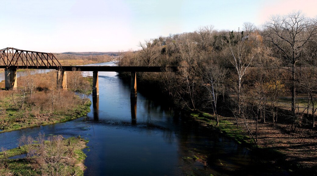 Historic iron swing bridge over the White River, near Cotter Arkansas. Old steel truss bridge built in 1905, stretches 285 feet long.