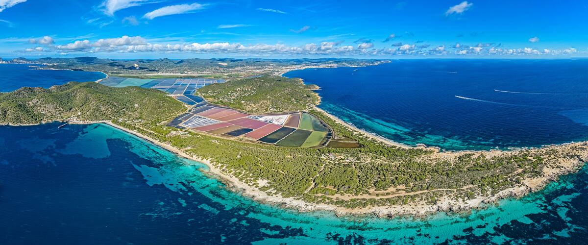 Aerial View of the Ses Salines Natural Park: Salt Marshes and Platja de Ses Salines Beach, Ibiza, Spain