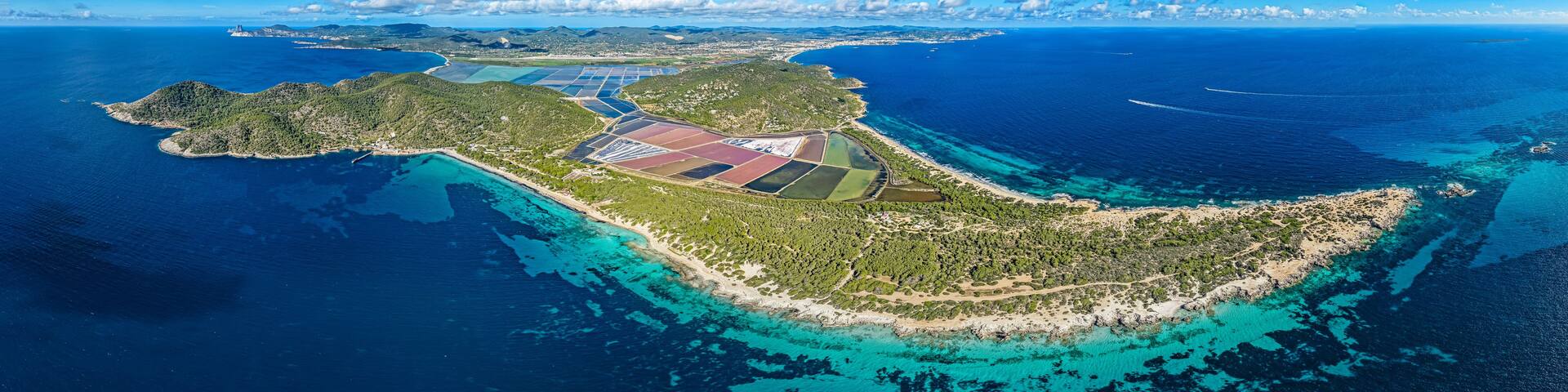 Aerial View of the Ses Salines Natural Park: Salt Marshes and Platja de Ses Salines Beach, Ibiza, Spain