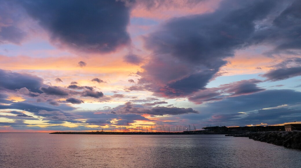 sunset over the port of Cecina.