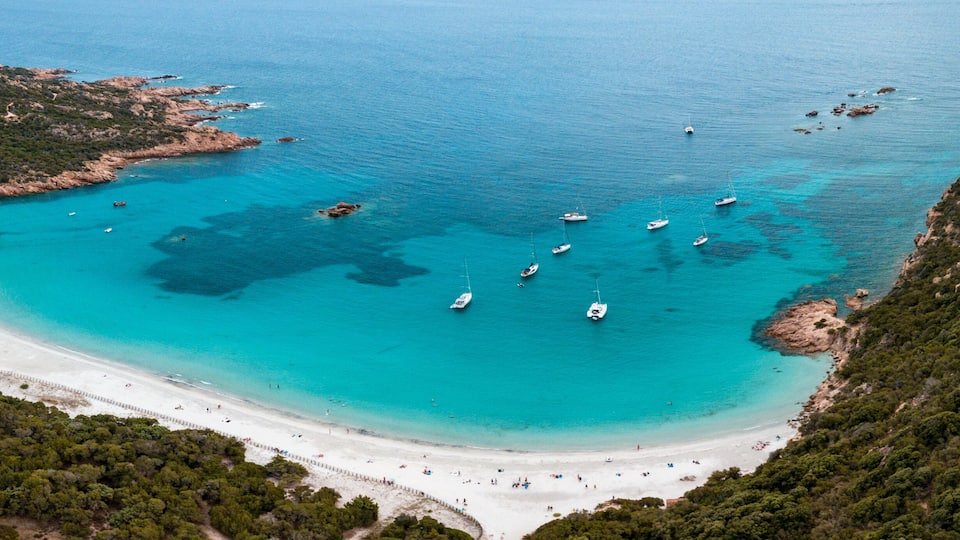 Aerial photo by drone of the roccapina beach in Sartène, the turquoise sea and the sleeping lion rock in Corsica