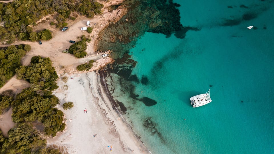 Aerial photo by drone of the roccapina beach in Sartène, the turquoise sea and the sleeping lion rock in Corsica