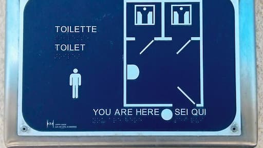 Too much information? The map shows the layout of the toilet, including one sink and two stalls with foot rests and hole. No WCs here. Spotted at Oulx train station.
