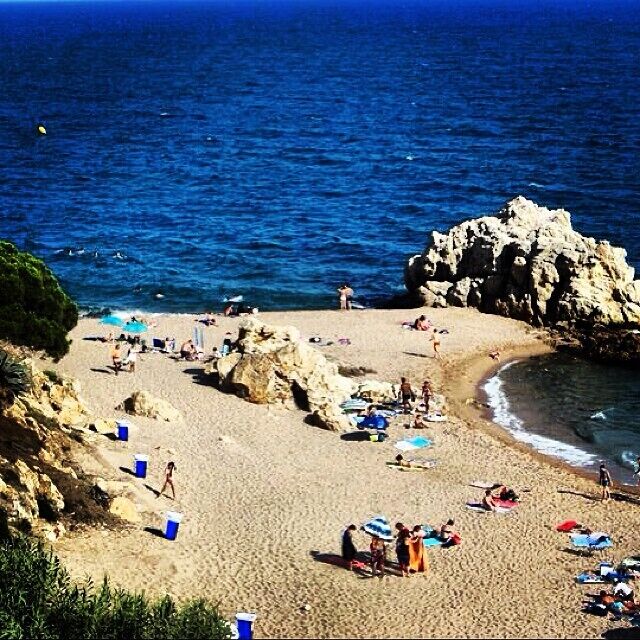 About an hour or so outside of Barcelona, is the lovely town of St Pol de Mar.

People from all over Spain flock here to go and relax on the beach.  As you can see it was a beautiful day when we showed up and it was great to get away from the hustle & bustle of our backpacking trip to just relax for a day.