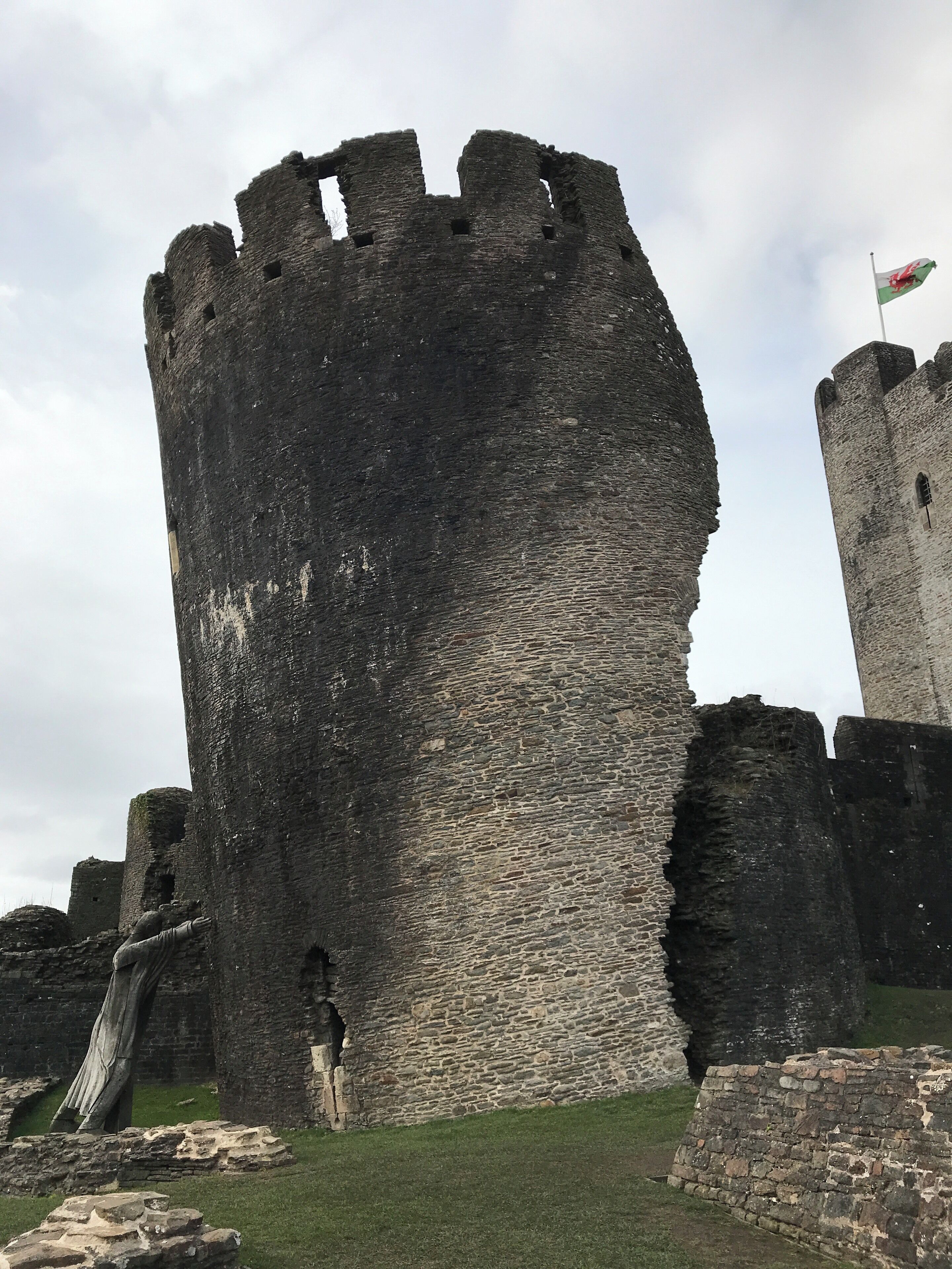The crooked tower. A giant wooden figure “holds” it up.