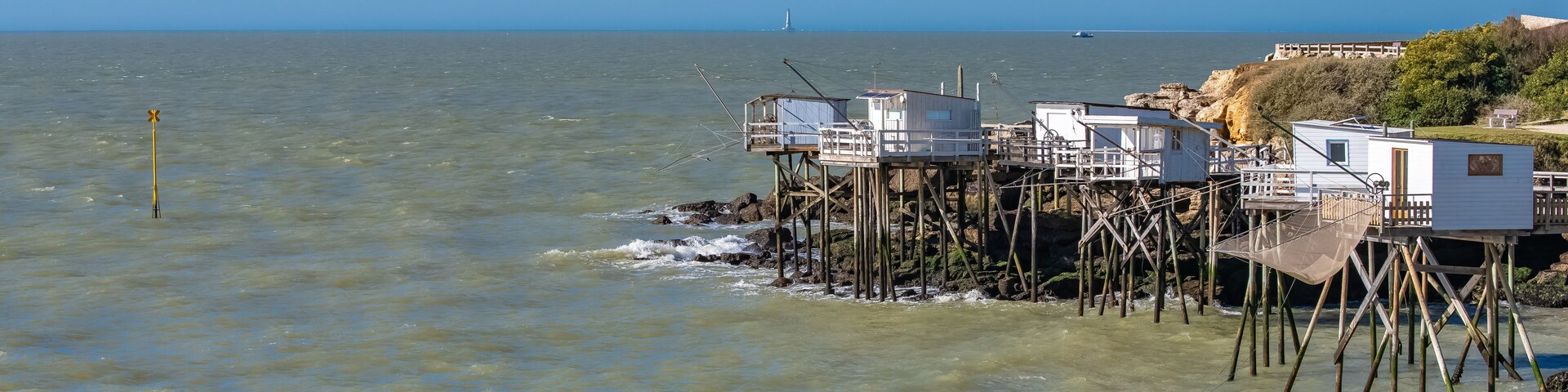 Royan in France, typical huts on stilts on the coast