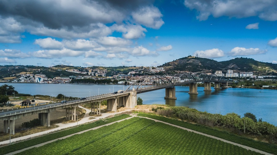 Aerial view of Vila Franca Xira, Lisbon, Portugal. Bridge Marechal Carmona on river Tagus. Drone photo.