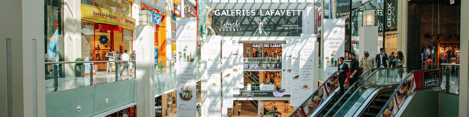 Dubai Mall featuring interior views, shopping and signage