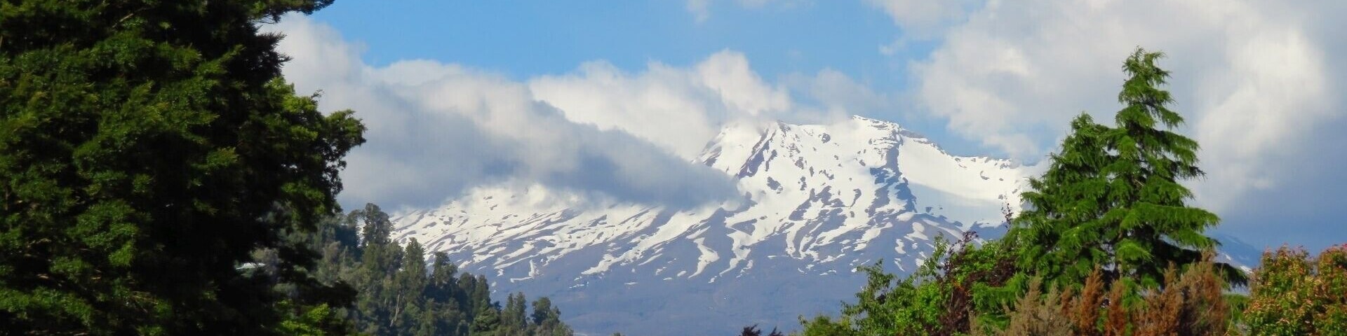 The Tongariro National Park encircles the volcanoes of Tongariro, Ngauruhoe and Ruapehu and features some of New Zealand's most contrasting landscapes.
Emerald lakes, alpine meadows and hot springs surround the largest volcanoes in the North Island, offering an environment of stunning diversity.
All three volcanoes are very much alive, with Mount Tongariro erupting as recently as August 2012. But this doesn’t deter people from skiing down the slopes and hiking to the craters – a monitoring system provides early warning of eruptions.
The mountains of this national park have deep spiritual significance for the Maori people. Legend has it that the high priest Ngatoroirangi was frozen in a snowstorm while exploring Tongariro and called to Hawaiki, the traditional Polynesian homeland of the Maori, for fire. His prayer was answered, via the channel we now call the Pacific Rim of Fire, and the mountain erupted.
#TakeAHike #Mountains