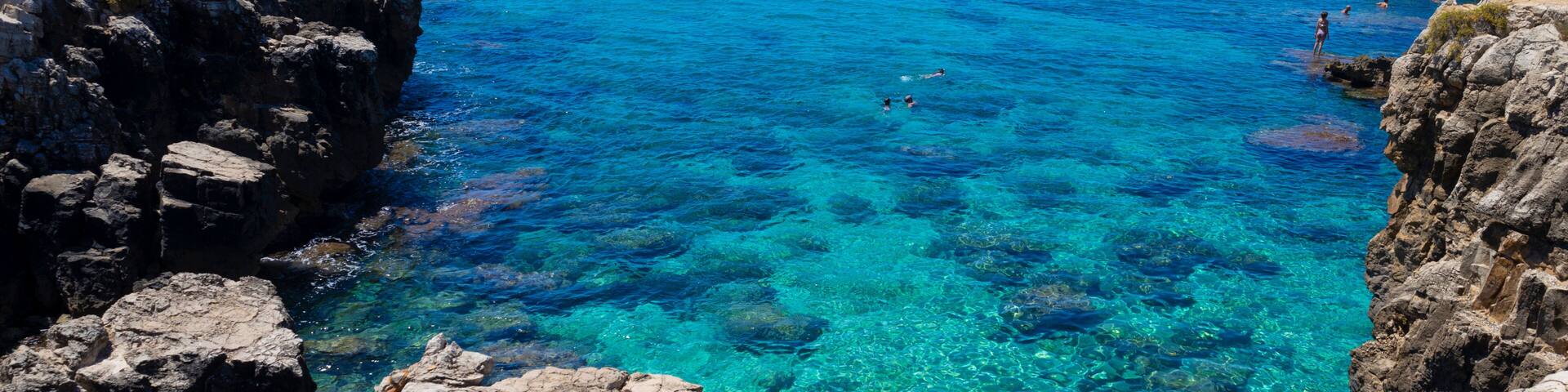 POSTO ROSSO, ITALY, JULY 15, 2022 - Turquoise waters in the seaside locality of Posto Rosso, Marina of Alliste in the province of Lecce, Salento, Puglia, Italy