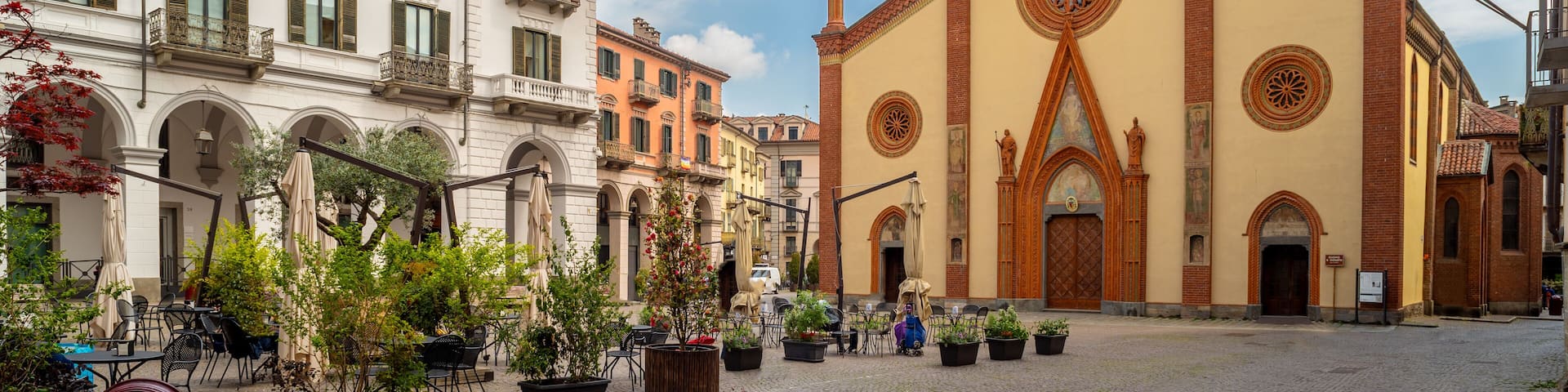 Pinerolo, Turin, Piedmont, Italy - April 29, 2023: San Donato Cathedral (10th - 15th cent.) in San Donato square